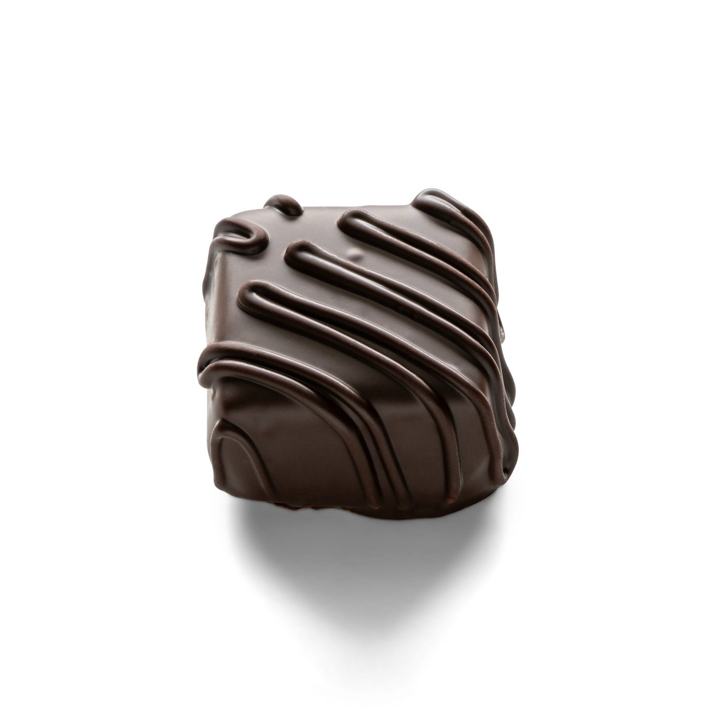 A cocoa truffle candy coated in dark chocolate