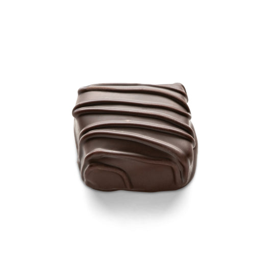 A toffee candy with chopped almonds covered in dark chocolate