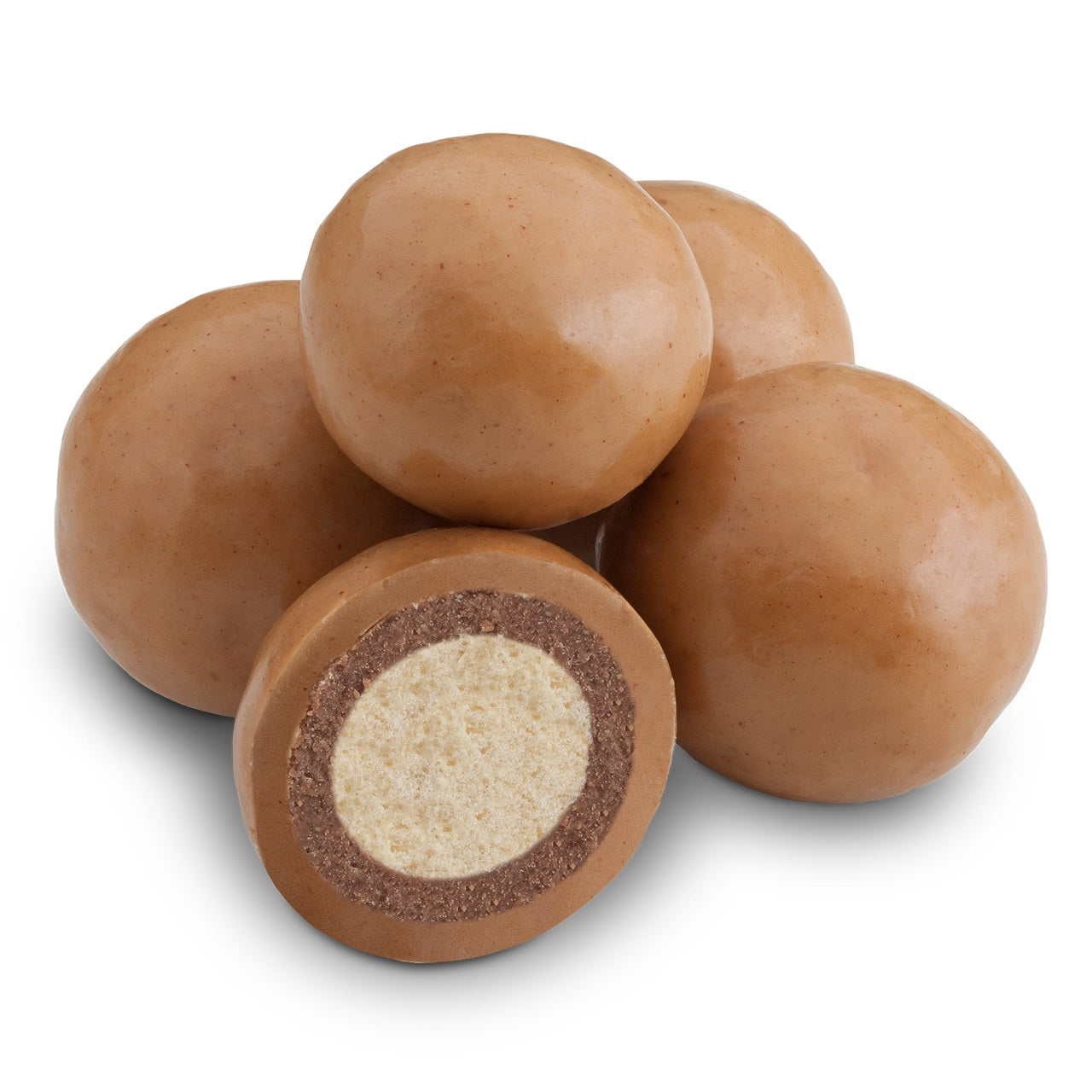 Close up image of coated malt balls with a malt ball cut in half