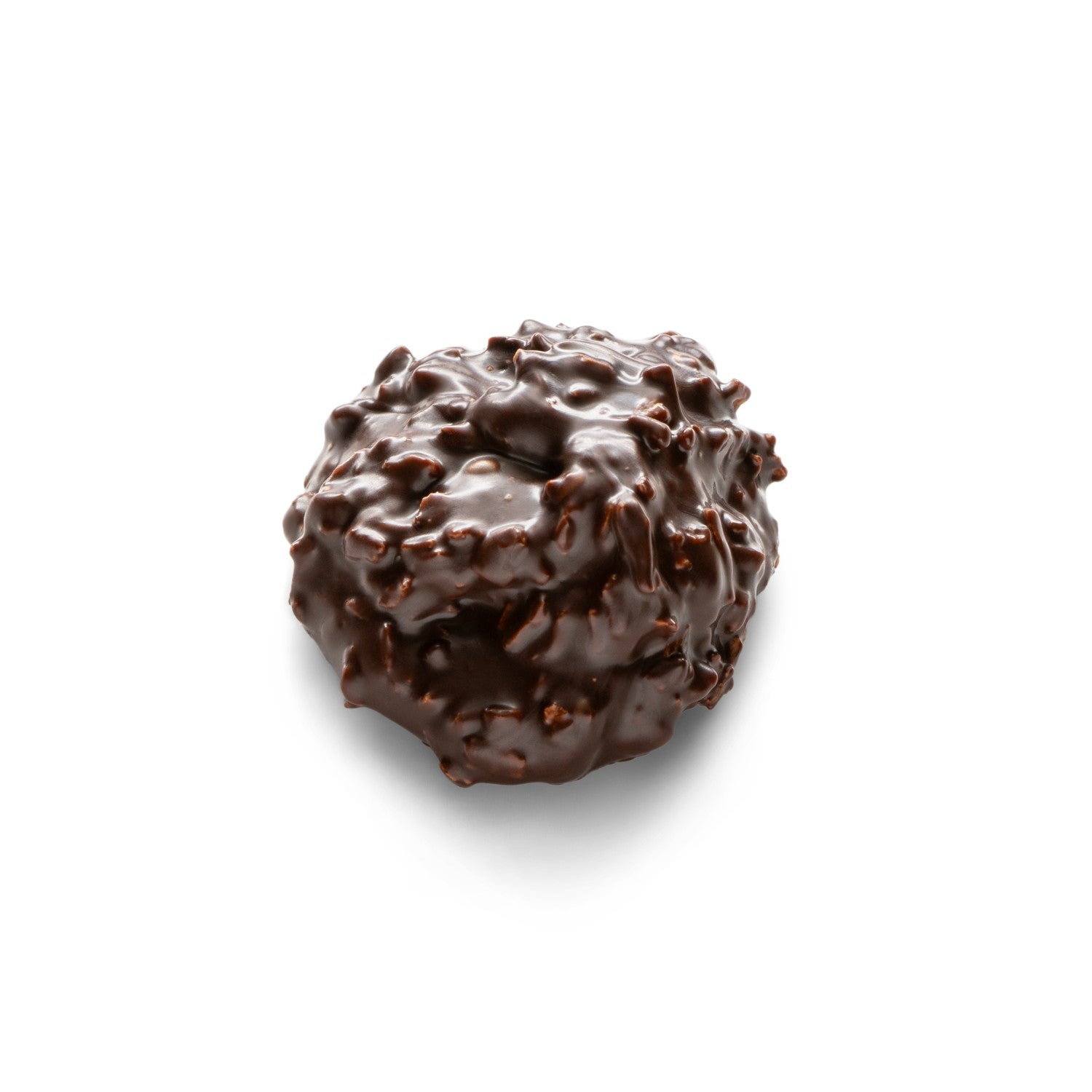 A cluster of shredded coconut and chopped almonds dipped in dark chocolate