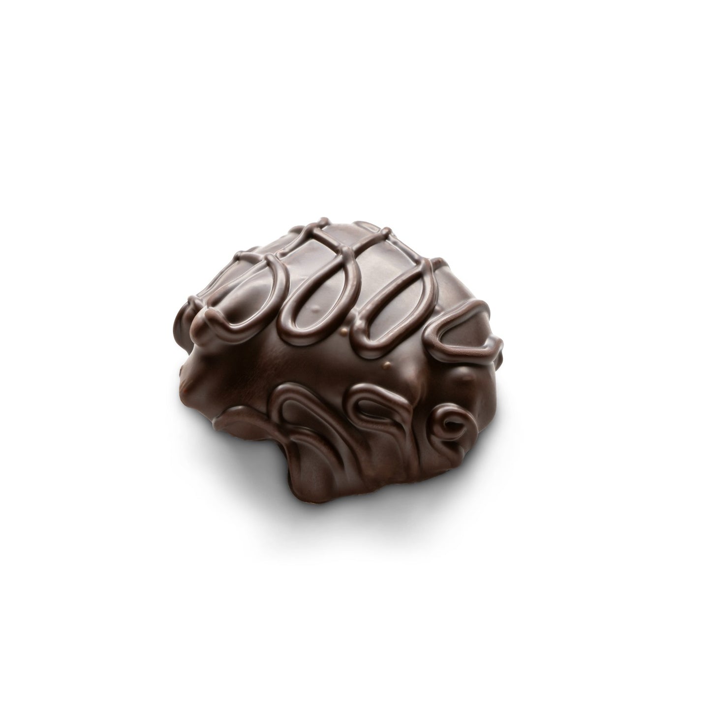 A caramel and pecan turtle covered in dark chocolate