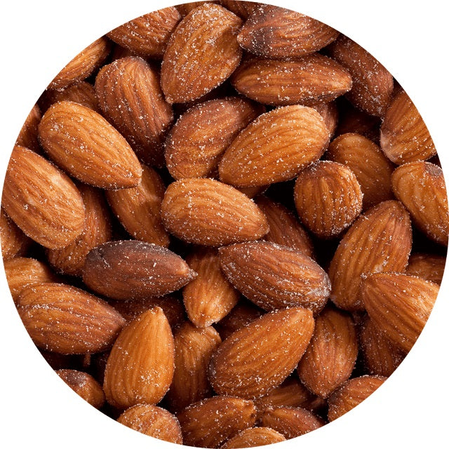 A circle image showing almonds roasted with a light dusting of salt