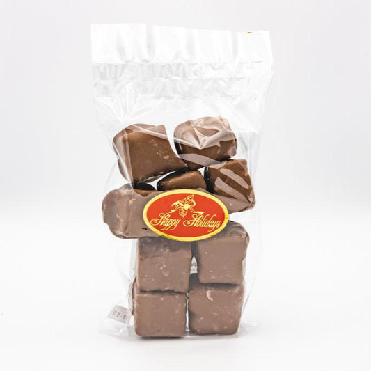 A milk chocolate seafoam gift bag displayed against a clean white background, showcasing its delightful contents