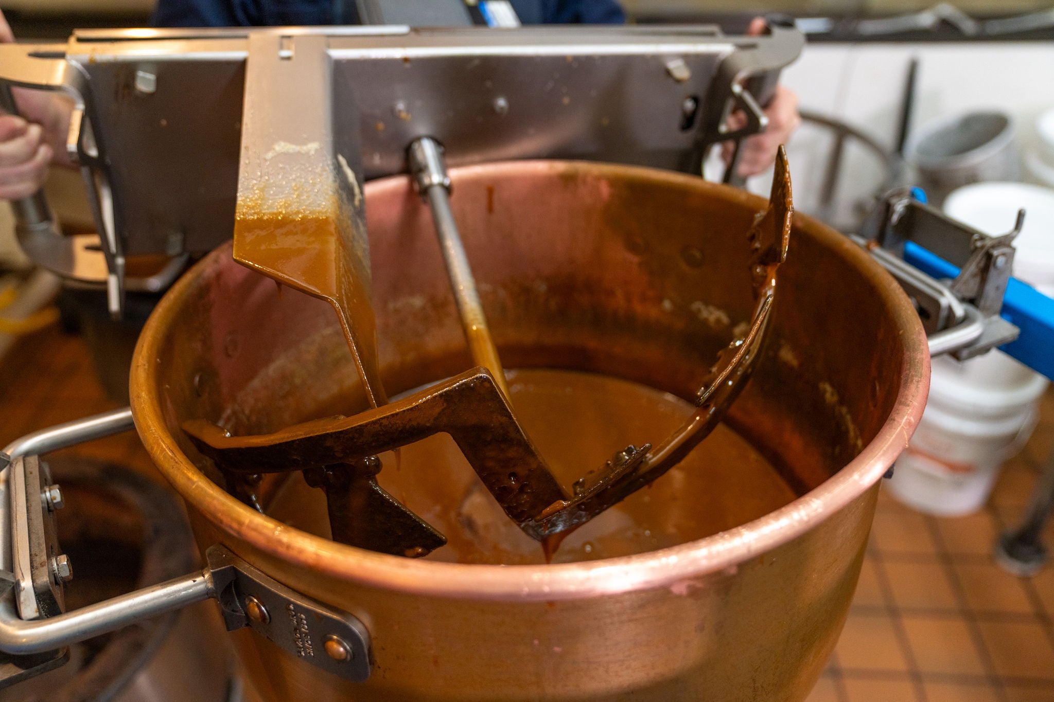 Copper kettle with caramel inside.