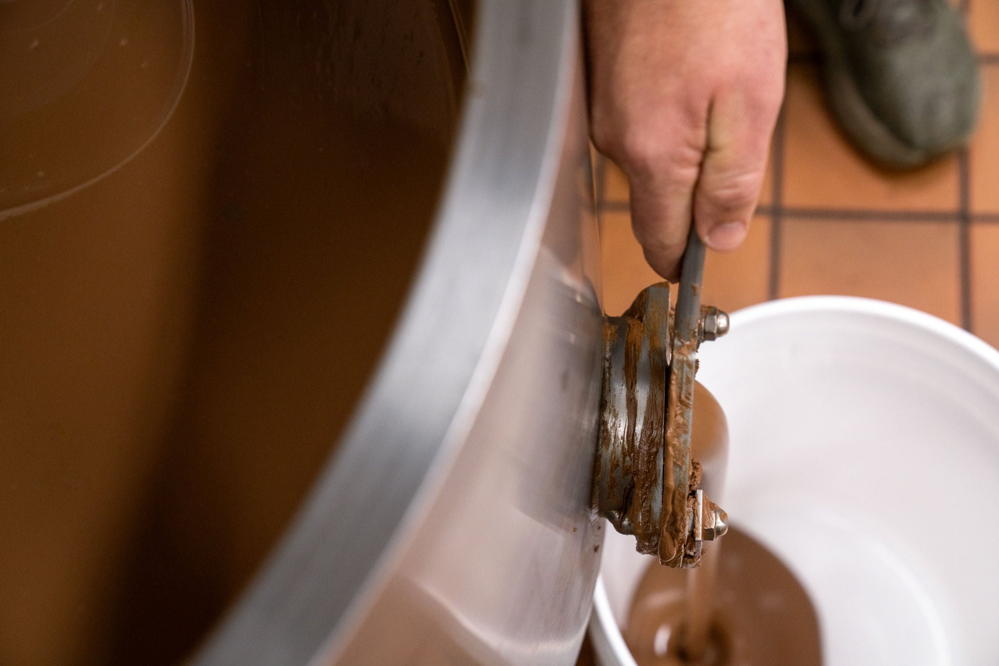 Chocolate melter dispensing milk chocolate