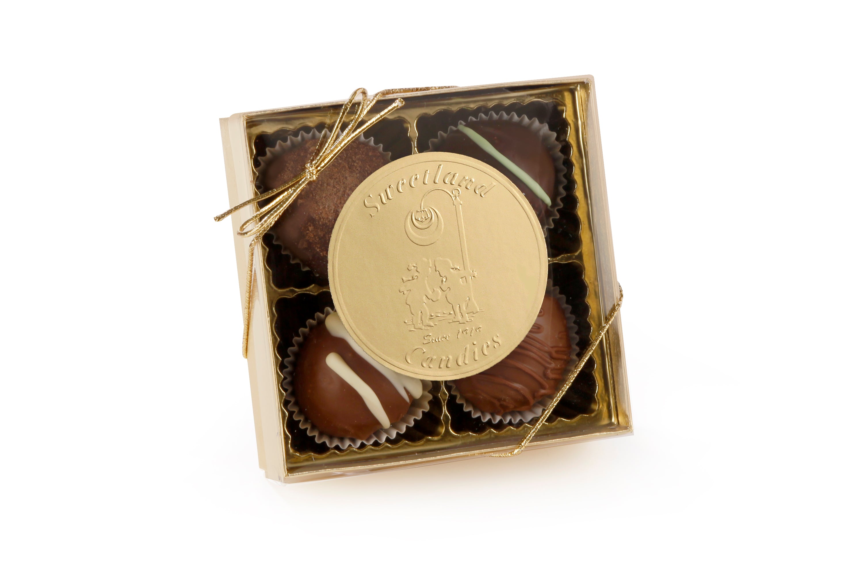 A gold gift box with 4 assorted chocolate truffle candies